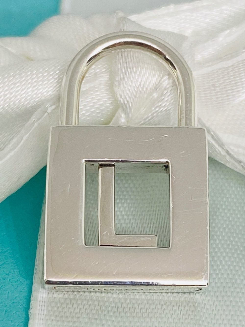 Tiffany & Co initial “L”  lock 925 silver